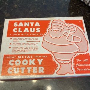 Vintage Santa and Angel cookie cutters in original box. Pristine condition.